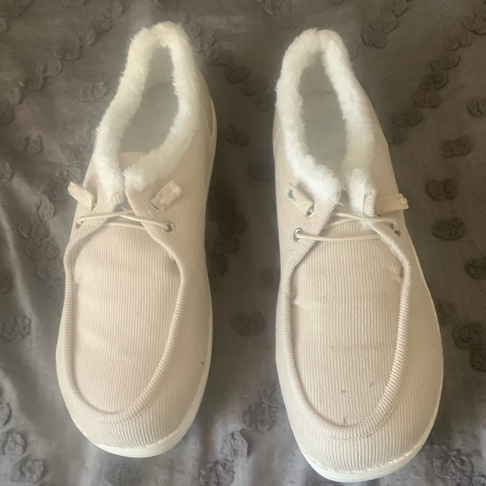Never worn ivory slip on shoes